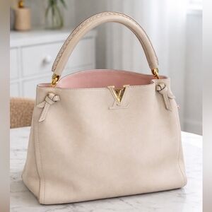 LOUIS VUITTON
Galet Taurillon Leather Tournon Hobo Bag